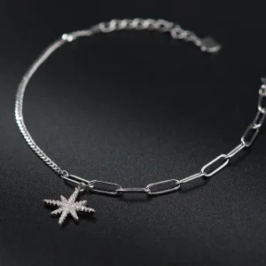 Srebrna narukvica sa karikama i priveskom zvezde