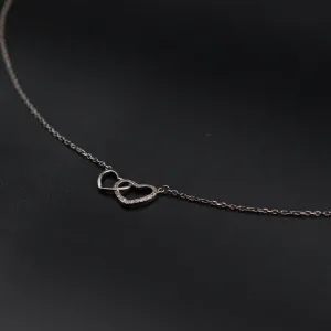 Srebrna ogrlica sa dva srca