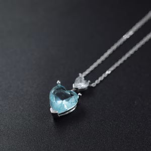 Srebrna ogrlica sa dva srca u svetlo plavoj boji