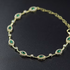 Srebrna narukvica sa pozlatom i zelenim kristalima